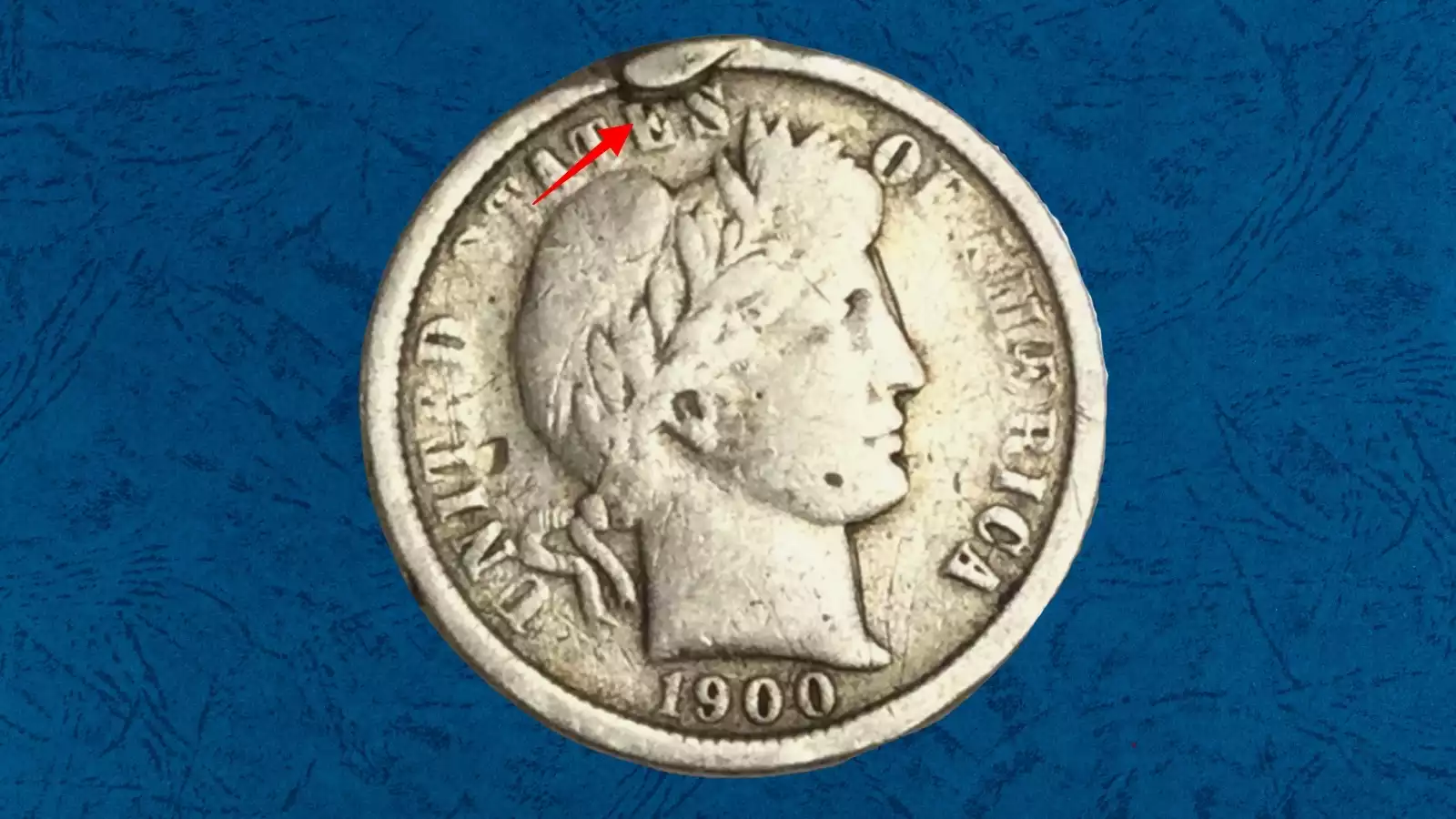 1900 Barber Quarter die crack or cud error showing raised line across the coin surface from die failure